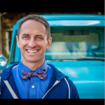 Ron Blake now lives in Phoenix, AZ with his spouse but grew up in a blue-collar Chicago suburb. He’s also lived in San Diego, Los Angeles, and England. Blake is an MPA graduate of Indiana University. He has completed five marathons and was once a high school physics teacher.